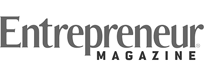 The image displays the logo of "Entrepreneur Magazine" in a serif font, primarily in dark green, against a transparent background. The logo is elegant and professional.